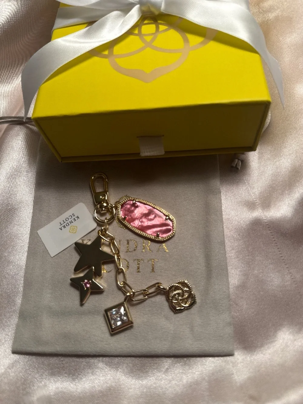 Pink Kendra Scott keychain with dust bag and box